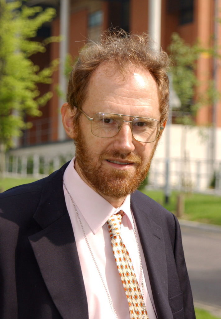 Professor Ben Martin outdoors, looking into the camera.